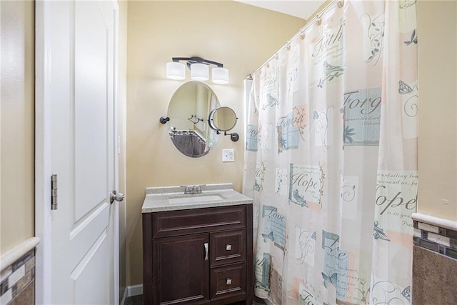 bathroom with vanity and a shower with shower curtain