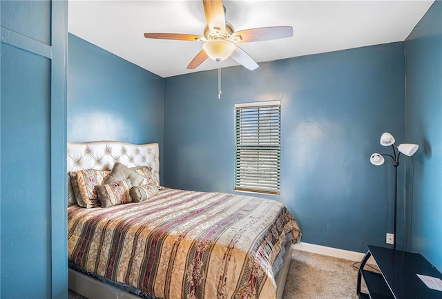 bedroom featuring ceiling fan and light carpet