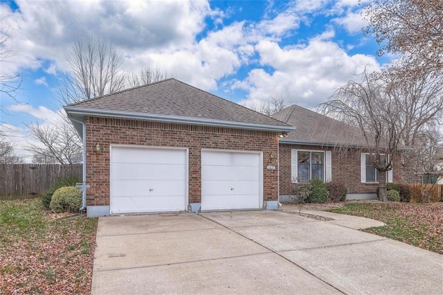 single story home with a garage