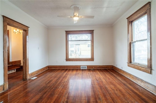 unfurnished room with ceiling fan, dark hardwood / wood-style floors, and ornamental molding