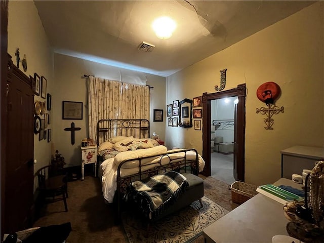 bedroom with dark carpet and ceiling fan