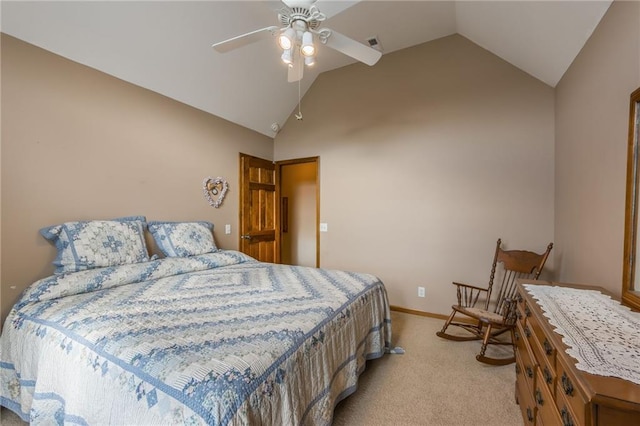 bedroom featuring ceiling fan, lofted ceiling, and light carpet