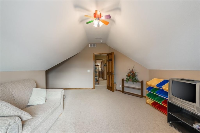 additional living space with ceiling fan, lofted ceiling, and carpet floors