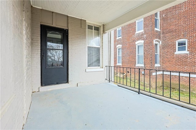 property entrance with covered porch