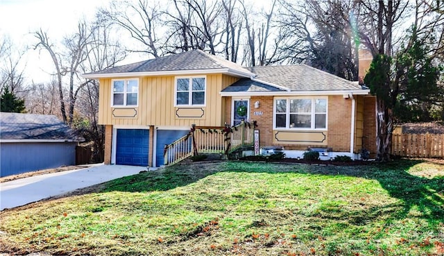 split level home featuring a garage and a front yard