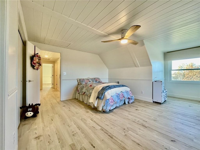 bedroom featuring light hardwood / wood-style flooring, ceiling fan, lofted ceiling, and wood ceiling