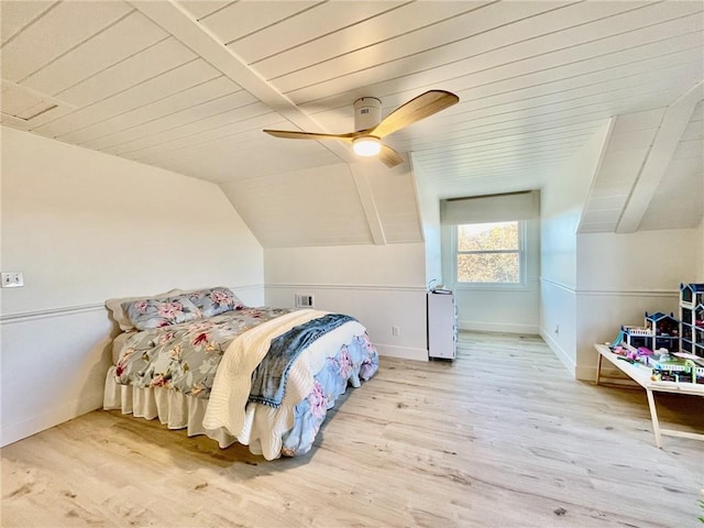 bedroom featuring ceiling fan, hardwood / wood-style floors, wood ceiling, and vaulted ceiling