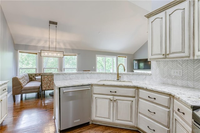 6764 Longview Rd, Shawnee, KS 66218 - kitchen with dishwasher, vaulted ceiling, a sink, a peninsula, and tasteful backsplash