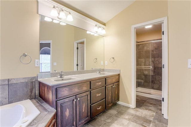 6764 Longview Rd, Shawnee, KS 66218 - bathroom featuring double vanity, a stall shower, a bath, and baseboards