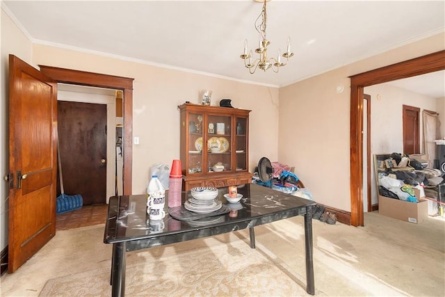 dining space featuring light carpet, an inviting chandelier, and ornamental molding