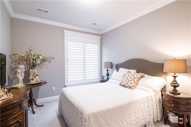 bedroom featuring light colored carpet and ornamental molding