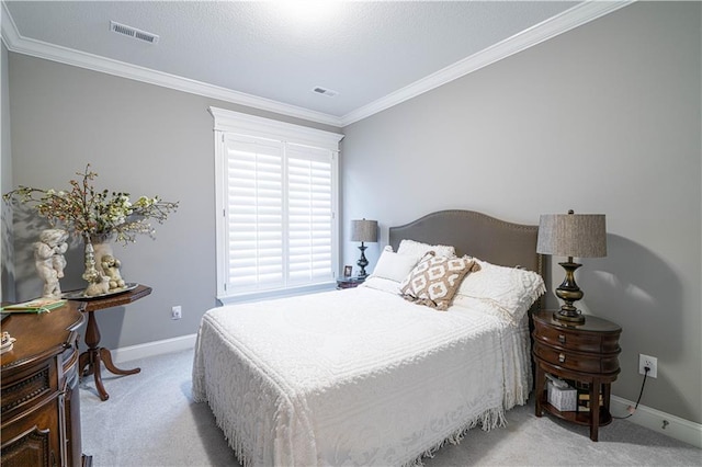 bedroom with light carpet and ornamental molding