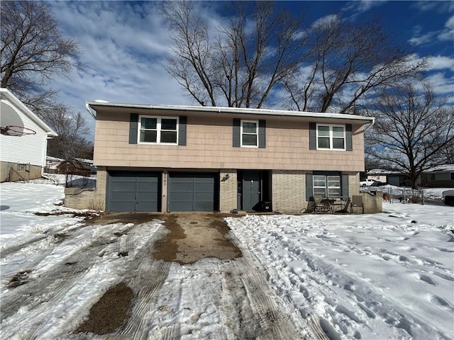 front of property with a garage