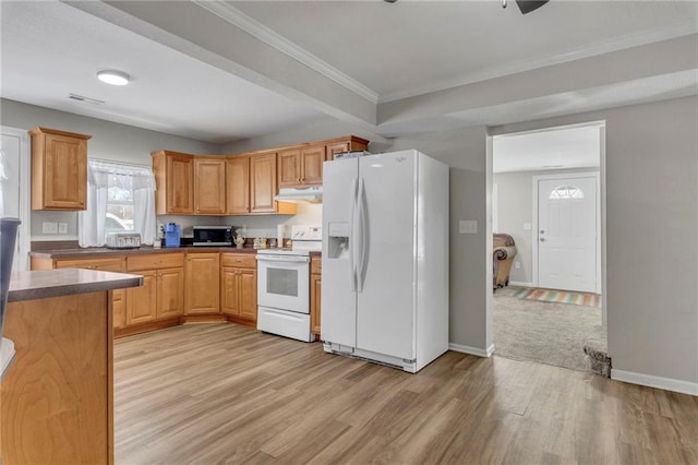 kitchen featuring white appliances, light hardwood / wood-style floors, and crown molding