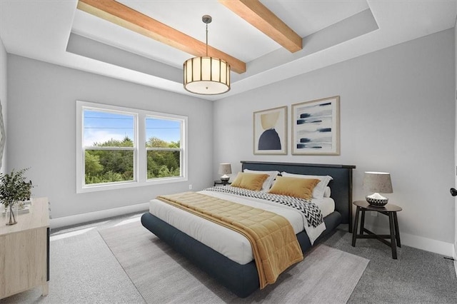 carpeted bedroom featuring beam ceiling