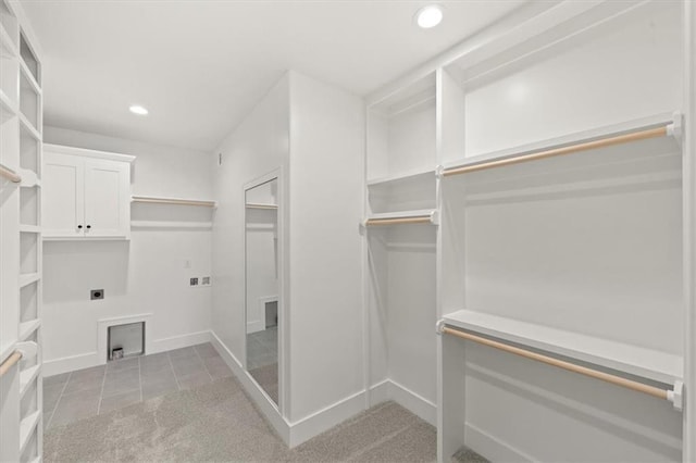 4027 NE Sagamore Dr Unit A, Lees Summit, MO 64064 - spacious closet featuring light tile patterned floors