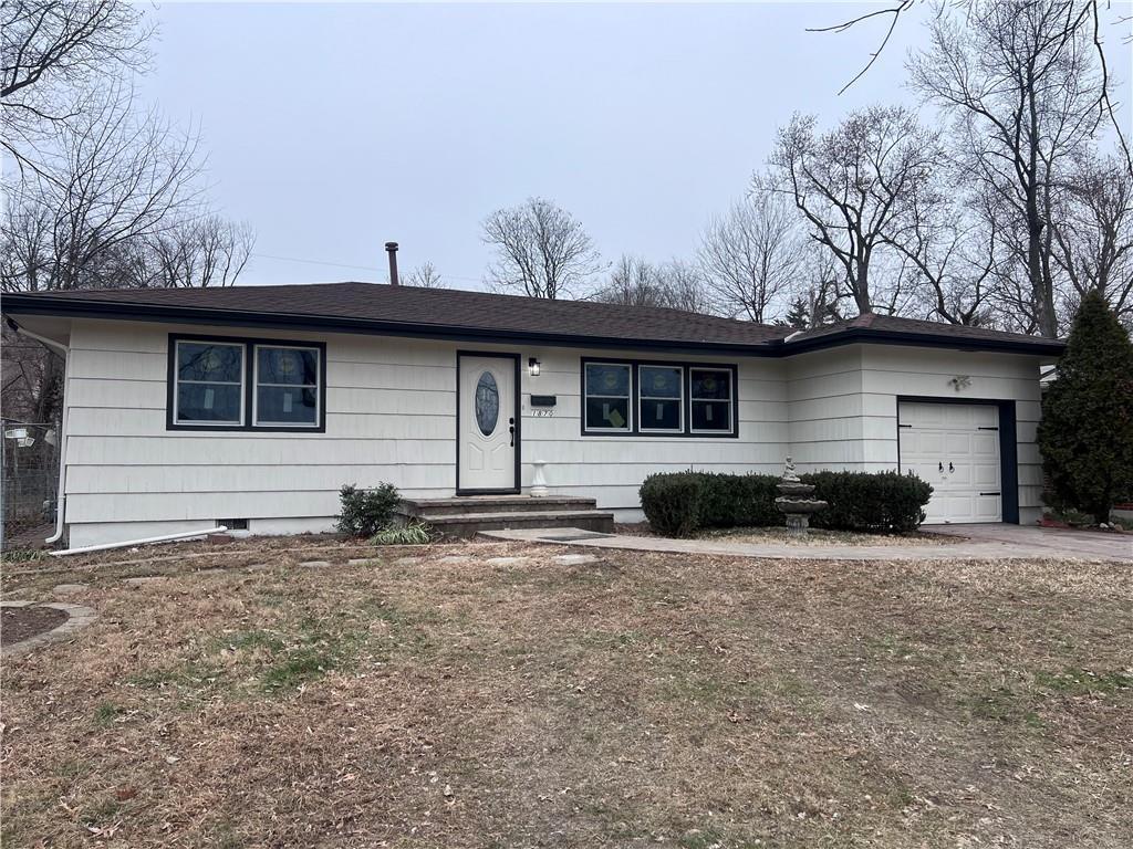 ranch-style house with a garage