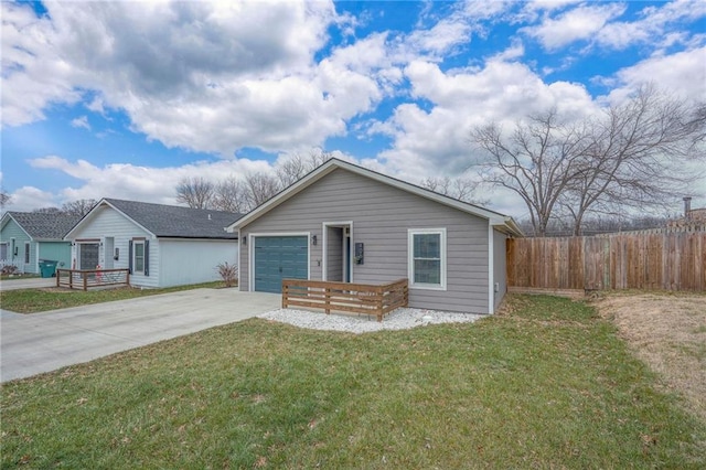 view of front of house featuring a front yard and a garage