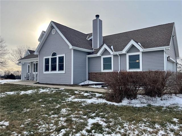 view of snow covered property