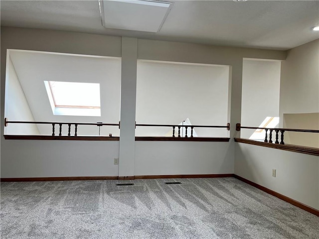 unfurnished room featuring carpet floors