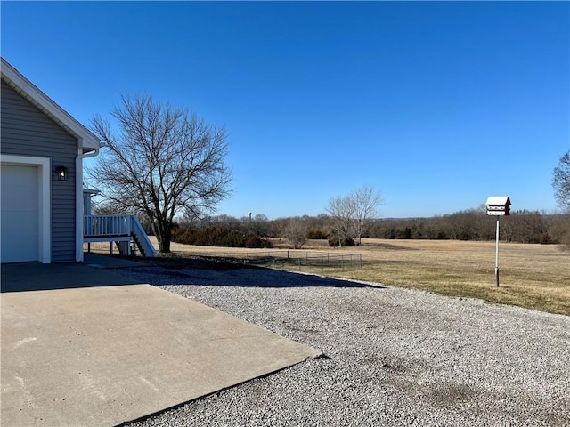 view of yard with a garage