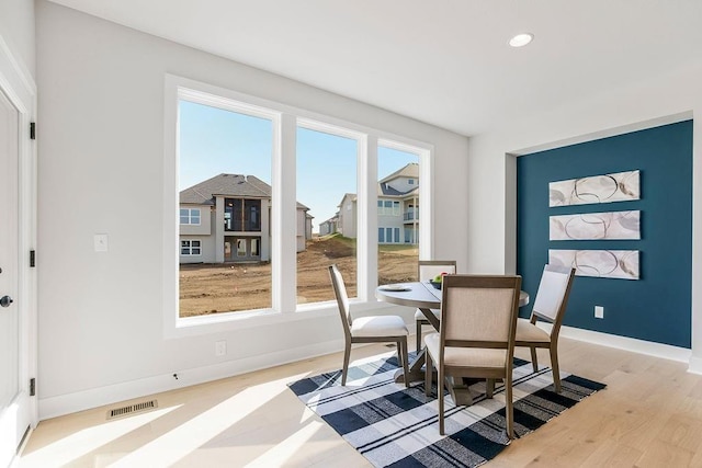 dining area featuring light hardwood / wood-style flooring