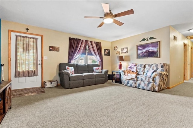 living room with carpet floors and ceiling fan