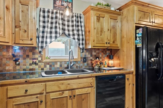 kitchen with sink, decorative backsplash, and black appliances