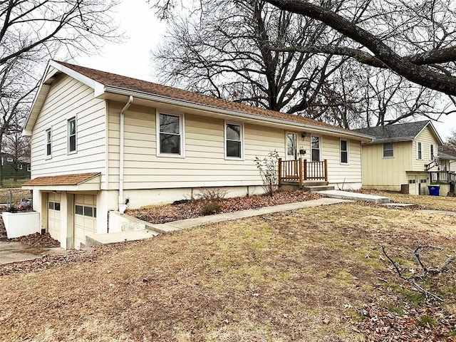 single story home with a garage