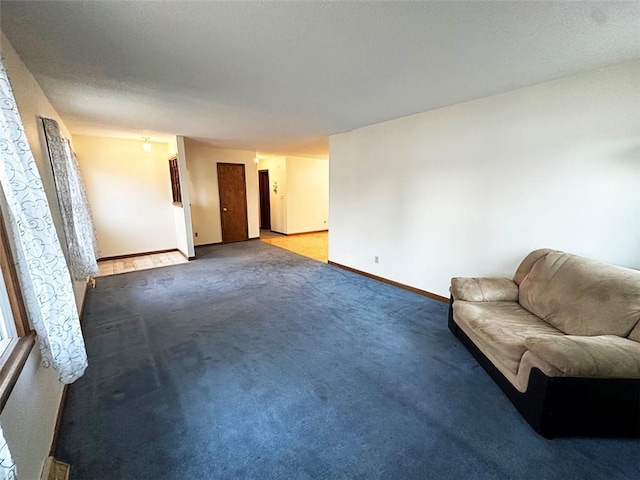 unfurnished room featuring carpet