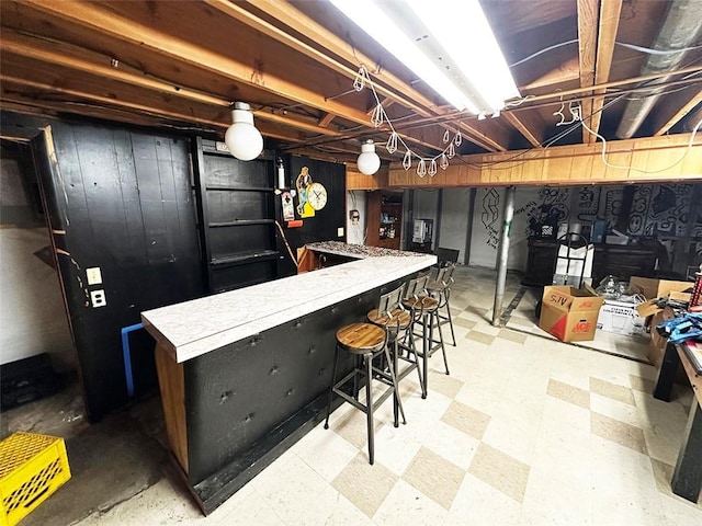 bar featuring wooden walls