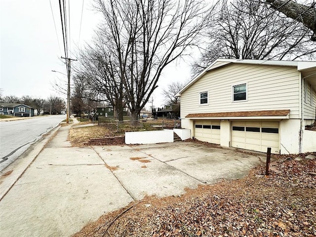 view of home's exterior with a garage