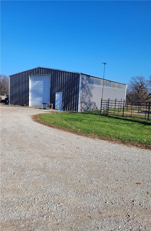 view of outbuilding featuring a garage