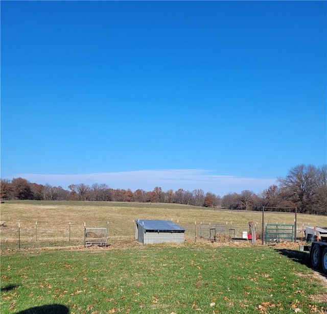 view of yard with a rural view