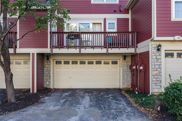 exterior space with a balcony and a garage