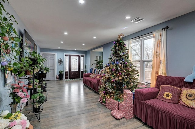 living room with light hardwood / wood-style flooring