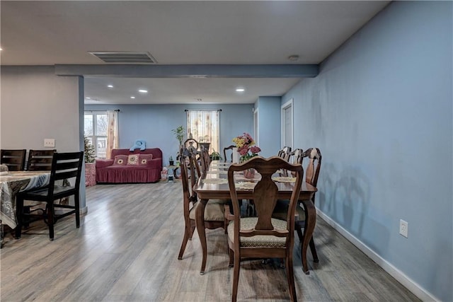 dining room with hardwood / wood-style floors