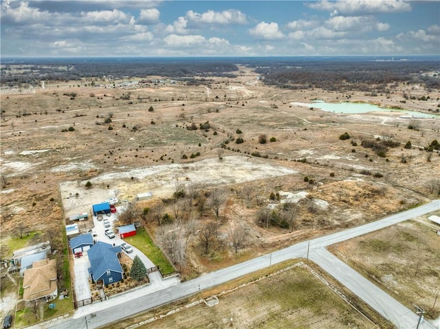 bird's eye view featuring a water view and a rural view