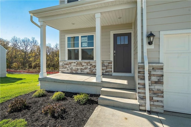 property entrance featuring covered porch