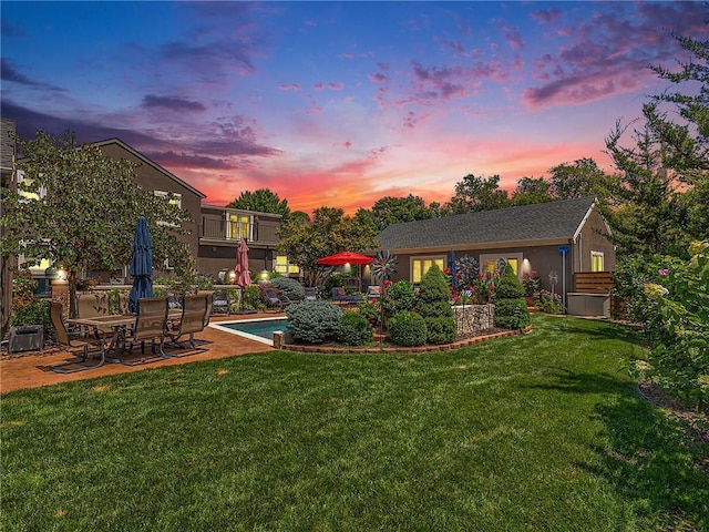 821 W 54th Ter, Kansas City, MO 64112 - view of green lawn with a patio area, an outdoor pool, and a balcony