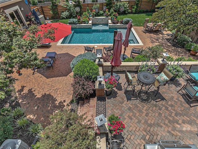 821 W 54th Ter, Kansas City, MO 64112 - view of swimming pool featuring a patio