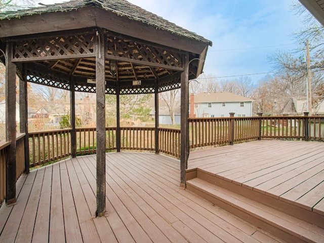 wooden terrace with a gazebo