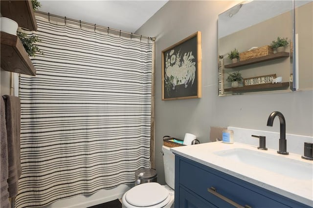 full bathroom featuring vanity, toilet, and shower / tub combo