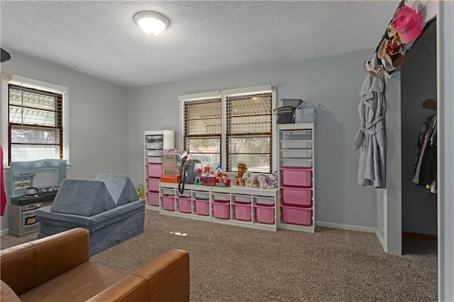 carpeted office with a textured ceiling