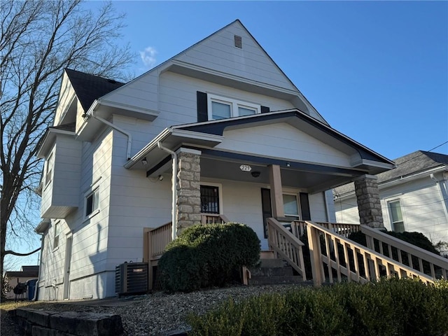 view of front of home featuring central AC unit and covered porch