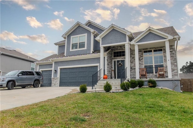 view of front of house featuring a garage and a front yard