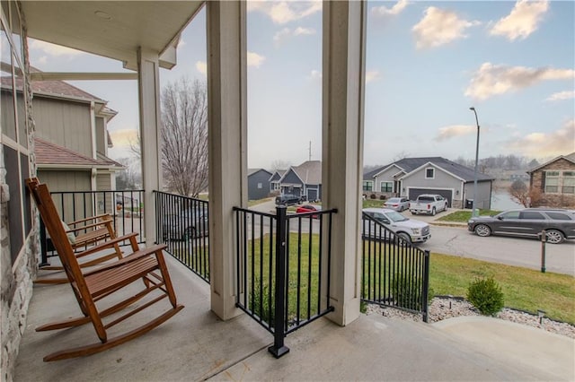 balcony featuring covered porch