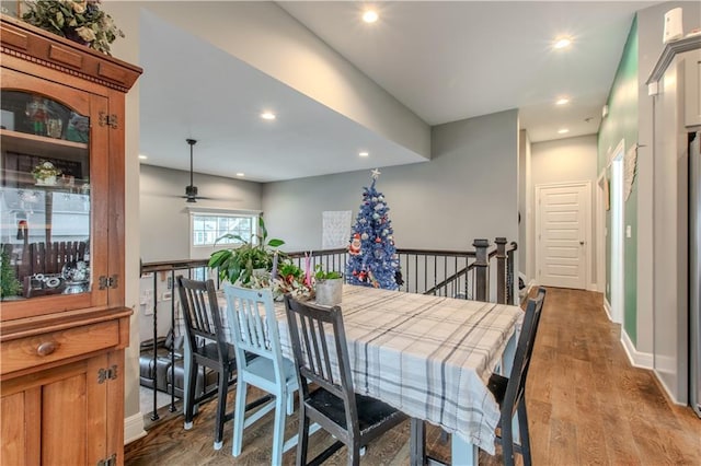 dining room featuring ceiling fan and light hardwood / wood-style floors