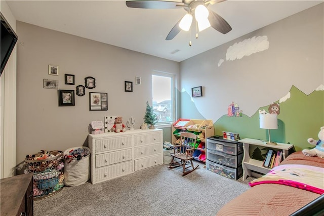 carpeted bedroom with ceiling fan