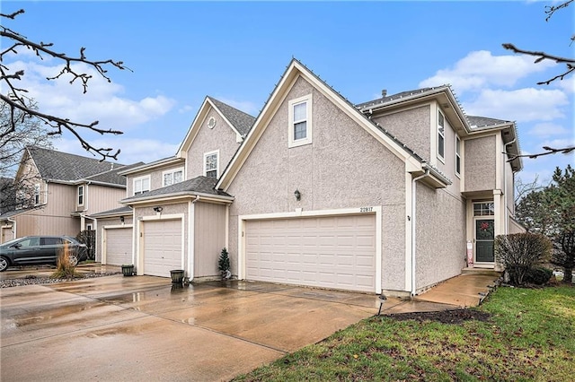 front facade with a garage